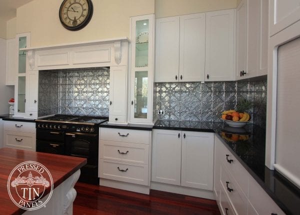 Pressed Tin Panels ‘Snowflakes’ pattern in silver powder coat, installed as a kitchen splashback by Flair Cabinets.