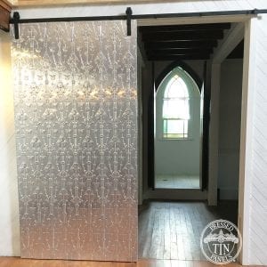 Pressed Tin Panels Lily Vertical installed on a sliding barn door