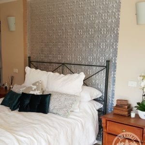 Pressed Tin Panels Lizards pattern installed as a bedroom feature wall