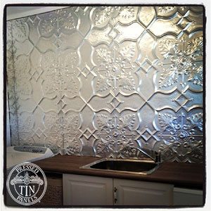 Image example of Pressed Tin Panels Shield pattern painted with aluminium coloured paint and installed as a laundry splashback